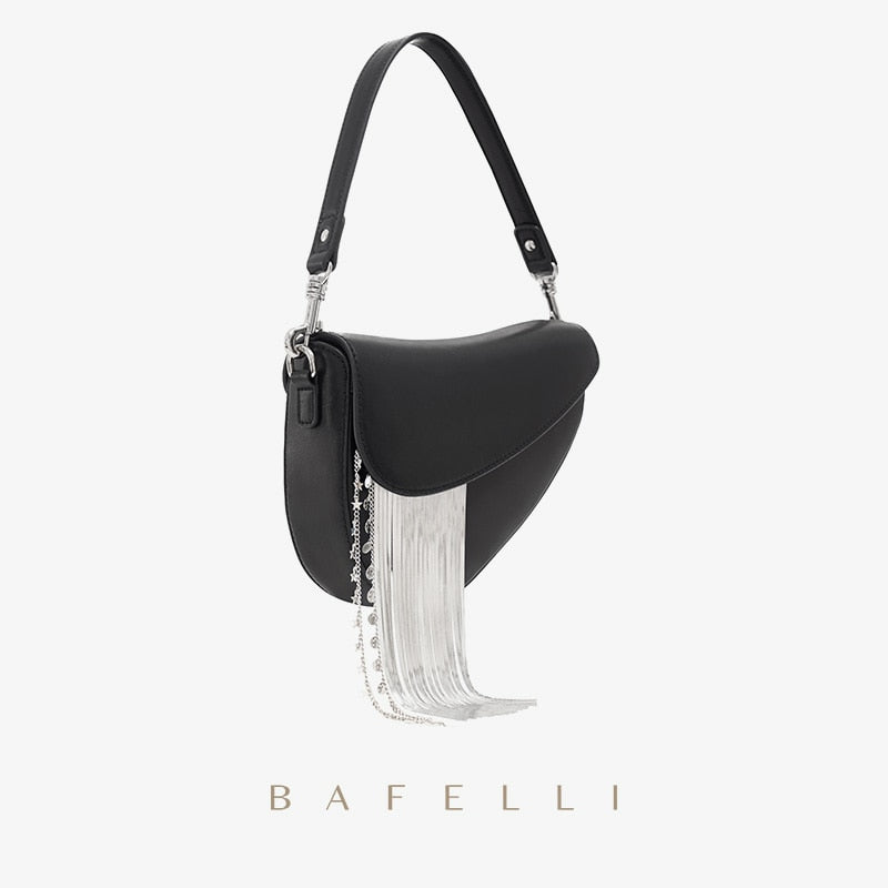 Cowhide Shoulder Bag with Tassel Detail – Designer Style